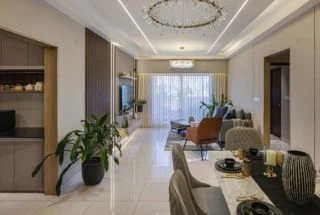 Elegant living room with blue ottoman